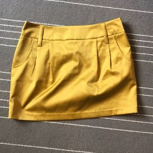 Size small gold mini skirt
